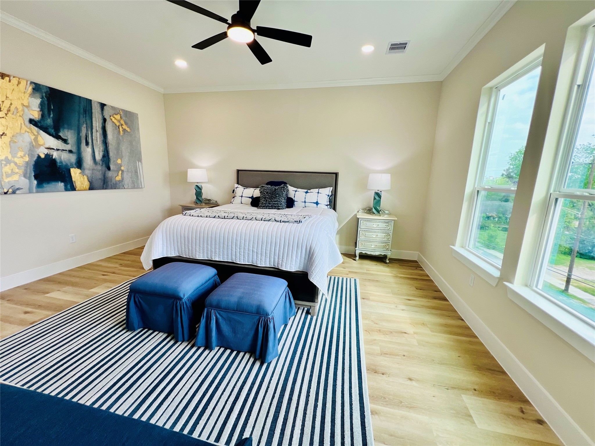 3233 Tuam Street Houston, TX 77004 - Photo 30 of 46 a bedroom with double bed and a large window