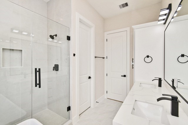 3233 Tuam Street Houston, TX 77004 - Photo 32 of 46 a bathroom with a sink a toilet and shower