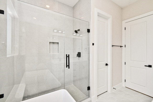 3233 Tuam Street Houston, TX 77004 - Photo 33 of 46 a bathroom with a shower and toilet