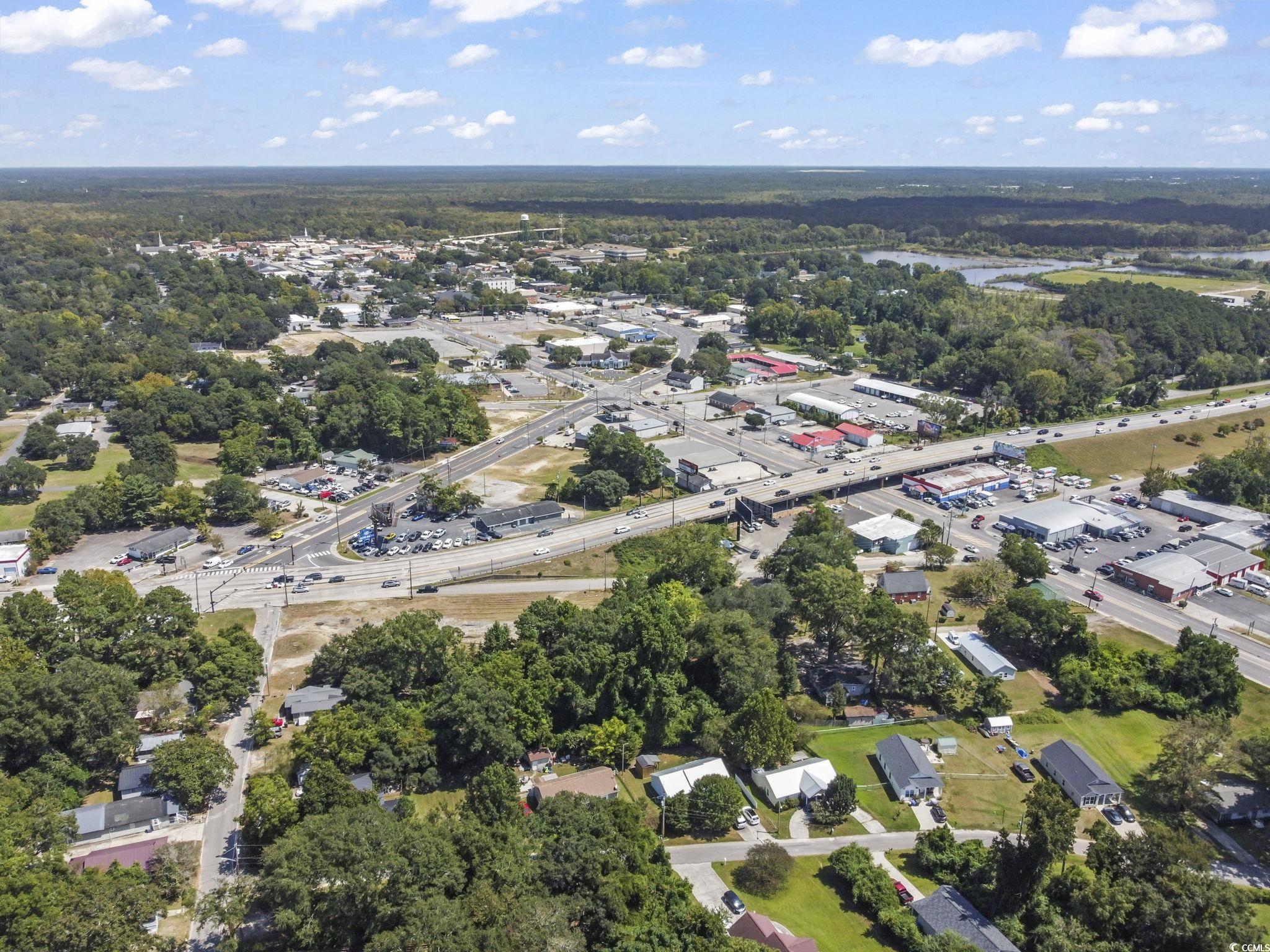 411 Apple Lane Conway, SC 29527 - Photo 6 of 9 Aerial view of property and surrounding area featuring a tree filled landscape