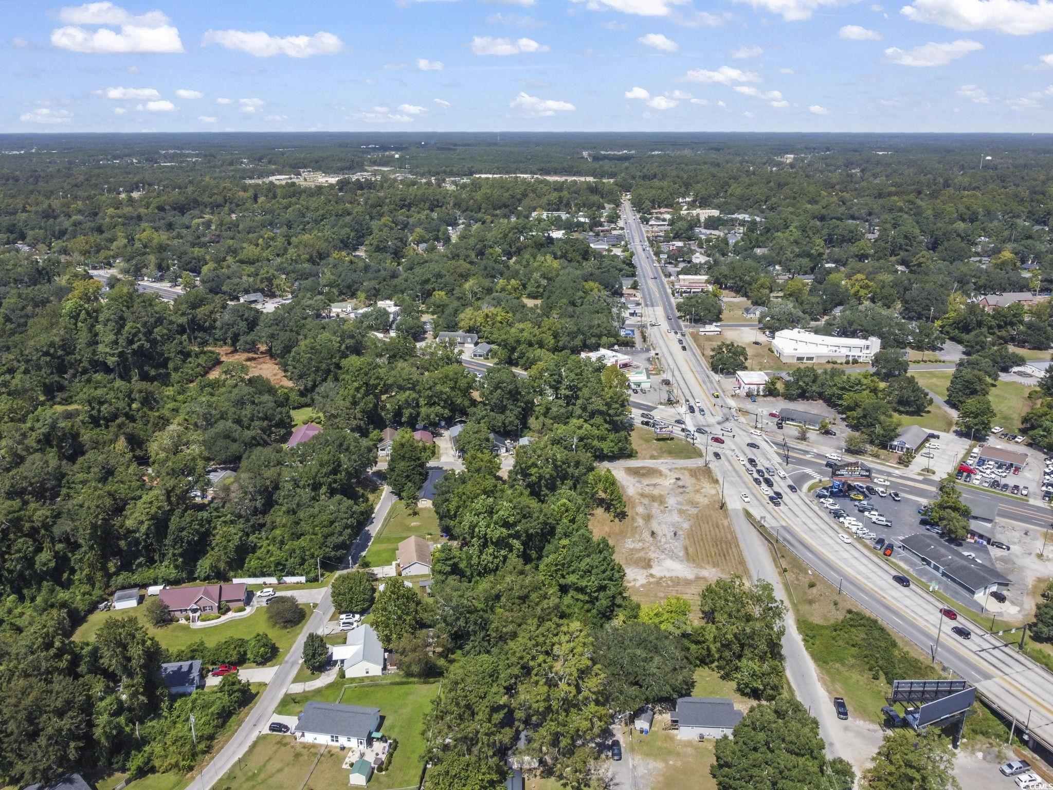 411 Apple Lane Conway, SC 29527 - Photo 8 of 9 Aerial view of a heavily wooded area and a highway