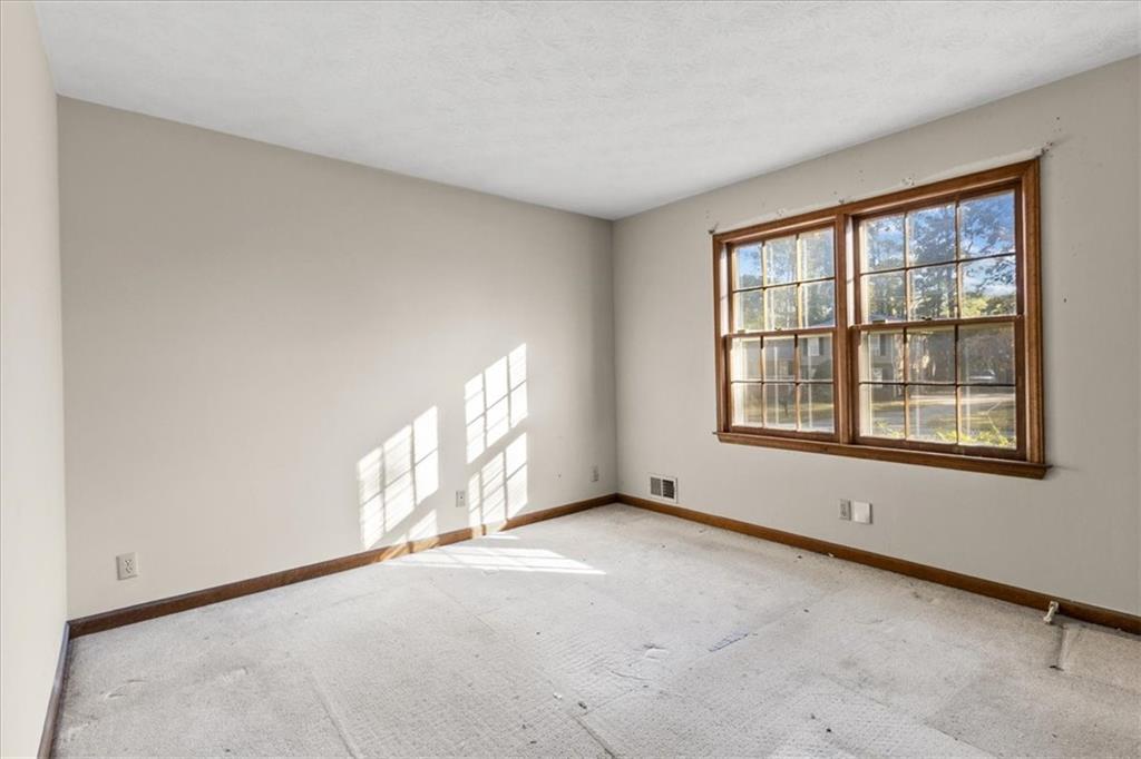 2075 Pinewood Drive Covington, GA 30016 - Photo 29 of 37 a view of an empty room with a window