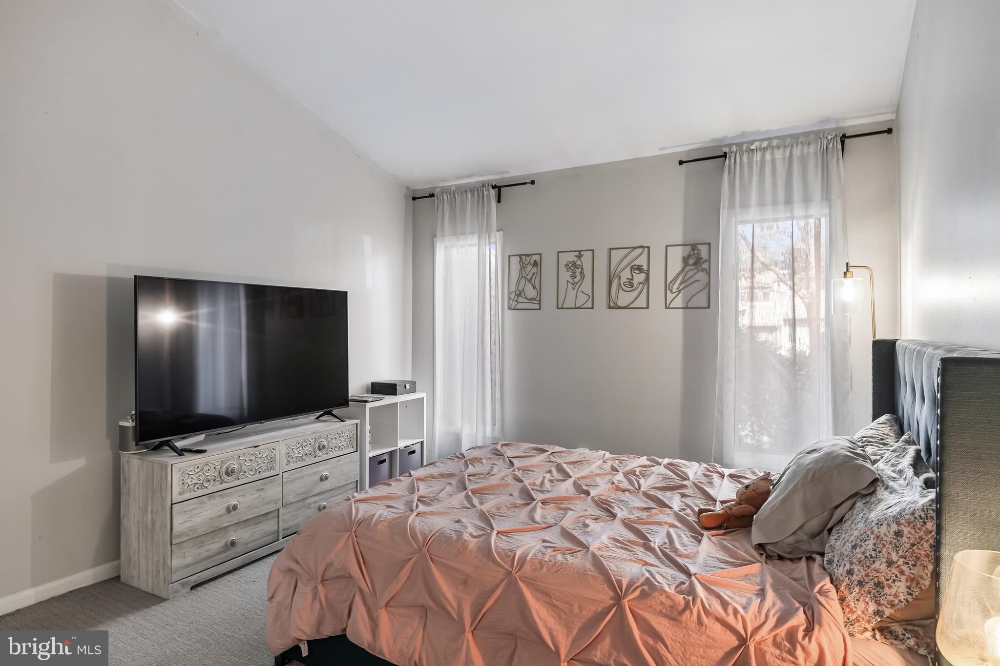 216 Uxbridge Cherry Hill, NJ 08034 - Photo 14 of 30 a bedroom with a flat screen tv on the dresser and a flat screen tv