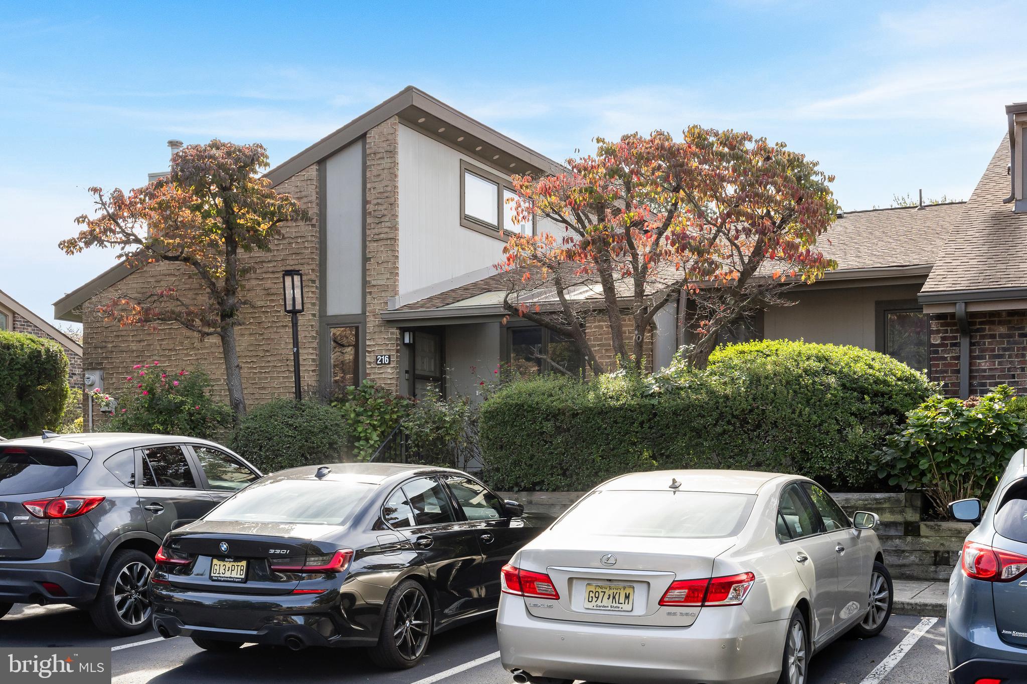 216 Uxbridge Cherry Hill, NJ 08034 - Photo 2 of 30 a white car parked in front of a house