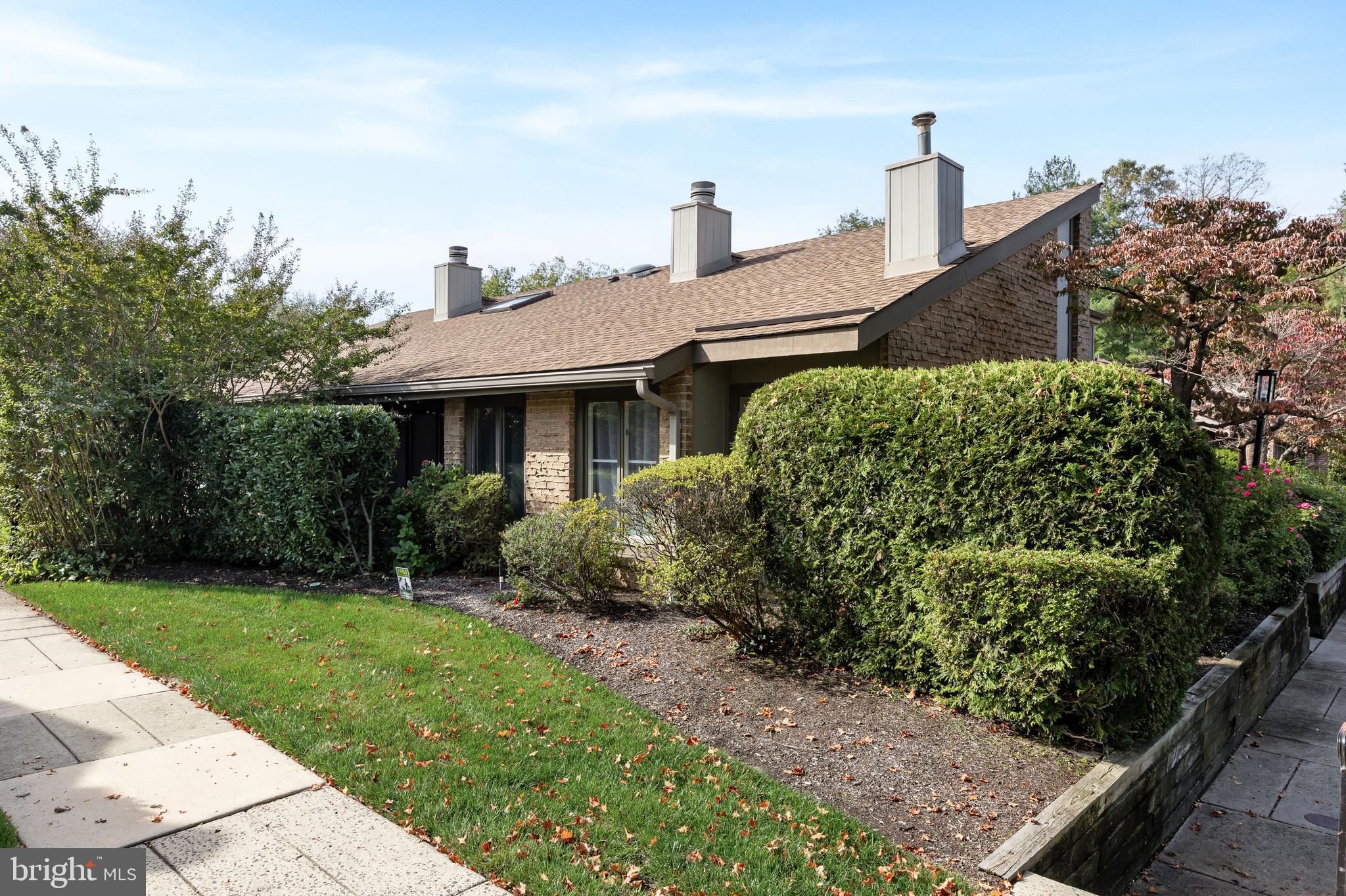 216 Uxbridge Cherry Hill, NJ 08034 - Photo 23 of 30 a front view of a house with a garden