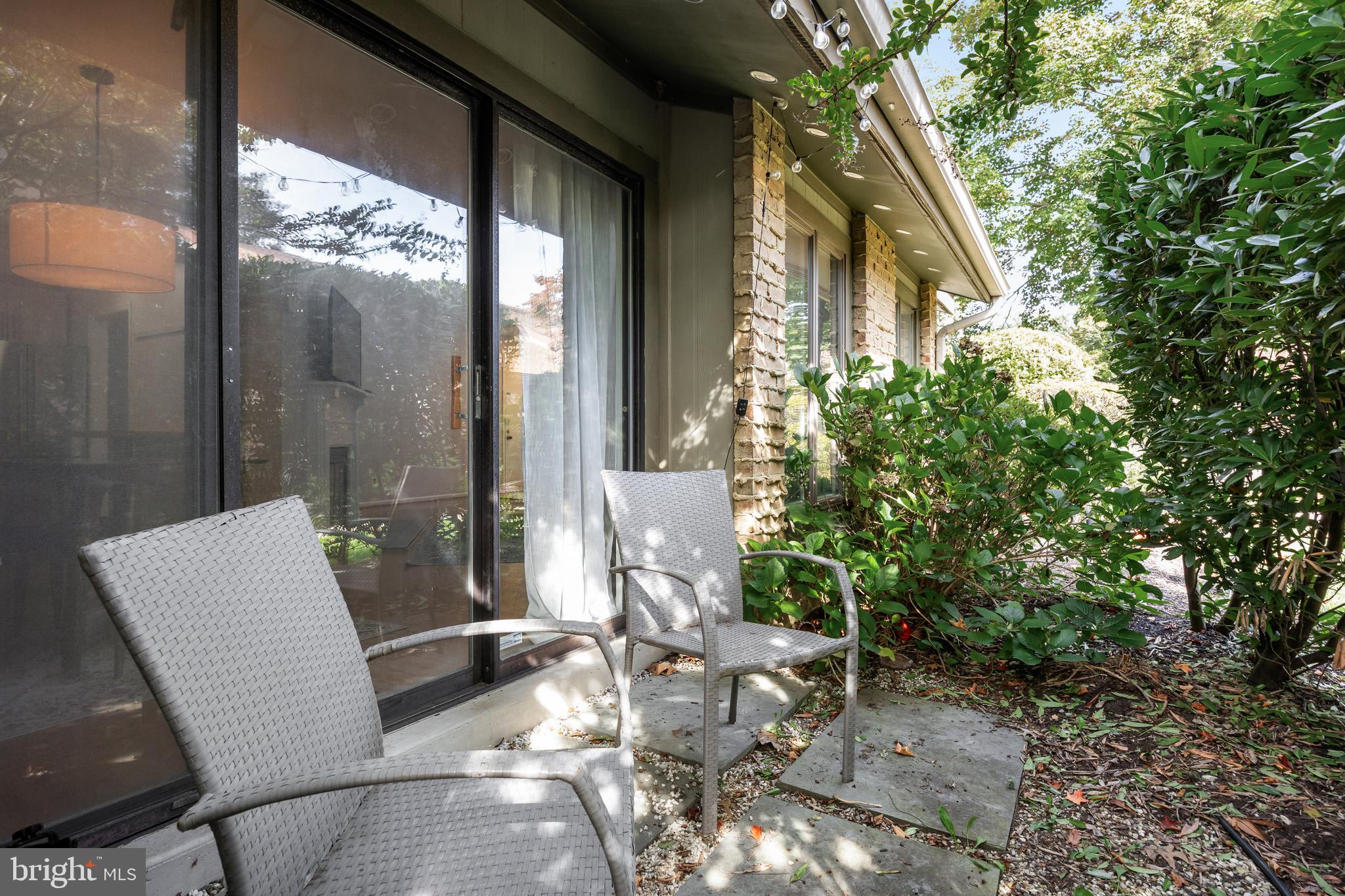 216 Uxbridge Cherry Hill, NJ 08034 - Photo 25 of 30 a view of backyard with outdoor seating and plants