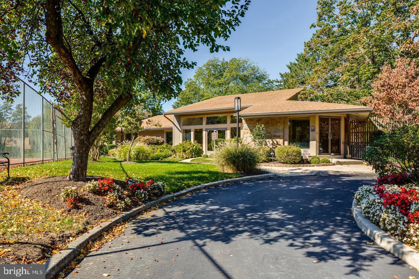 216 Uxbridge Cherry Hill, NJ 08034 - Photo 27 of 30 a front view of a house with garden