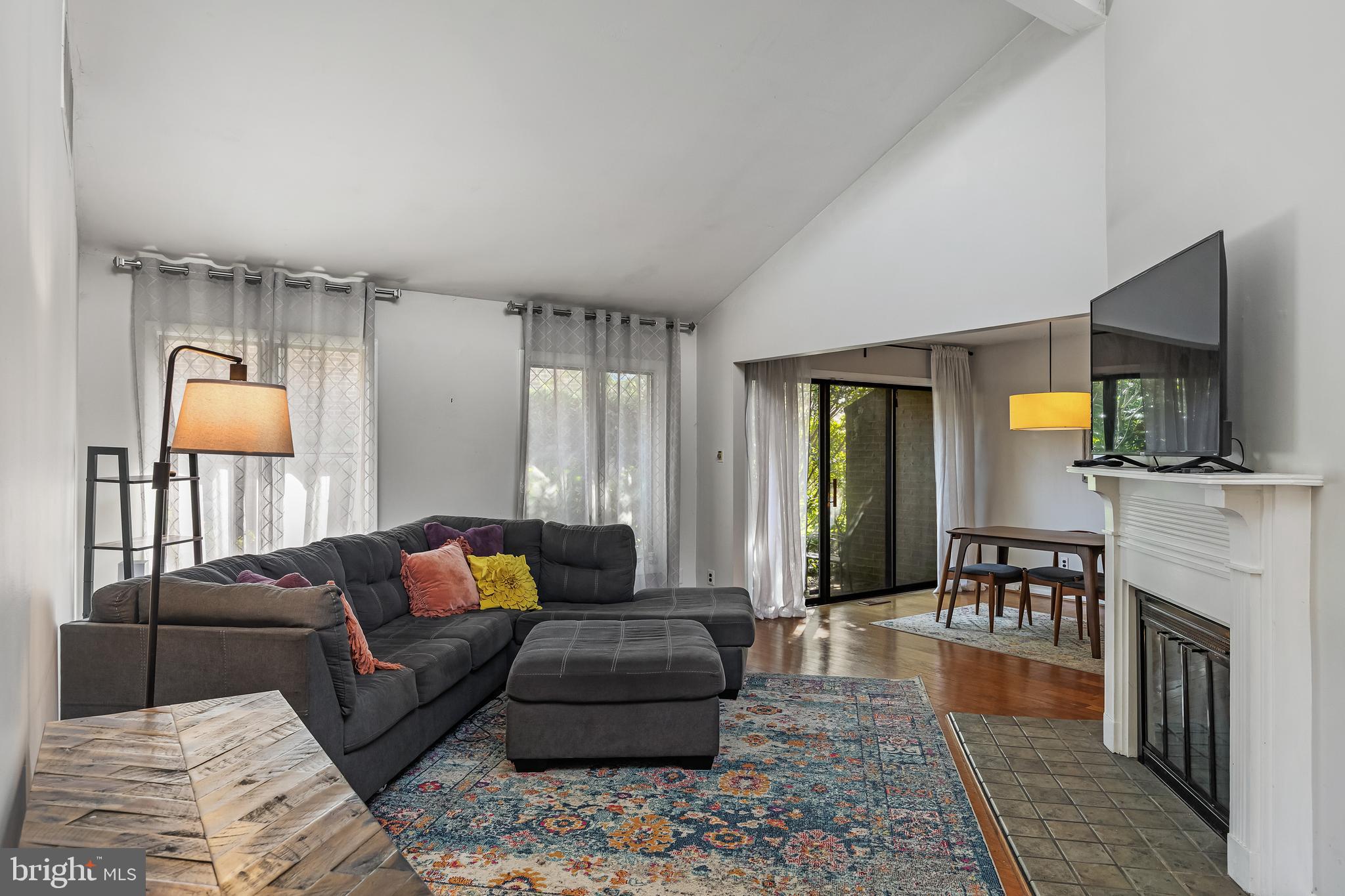 216 Uxbridge Cherry Hill, NJ 08034 - Photo 6 of 30 a living room with furniture and a fireplace