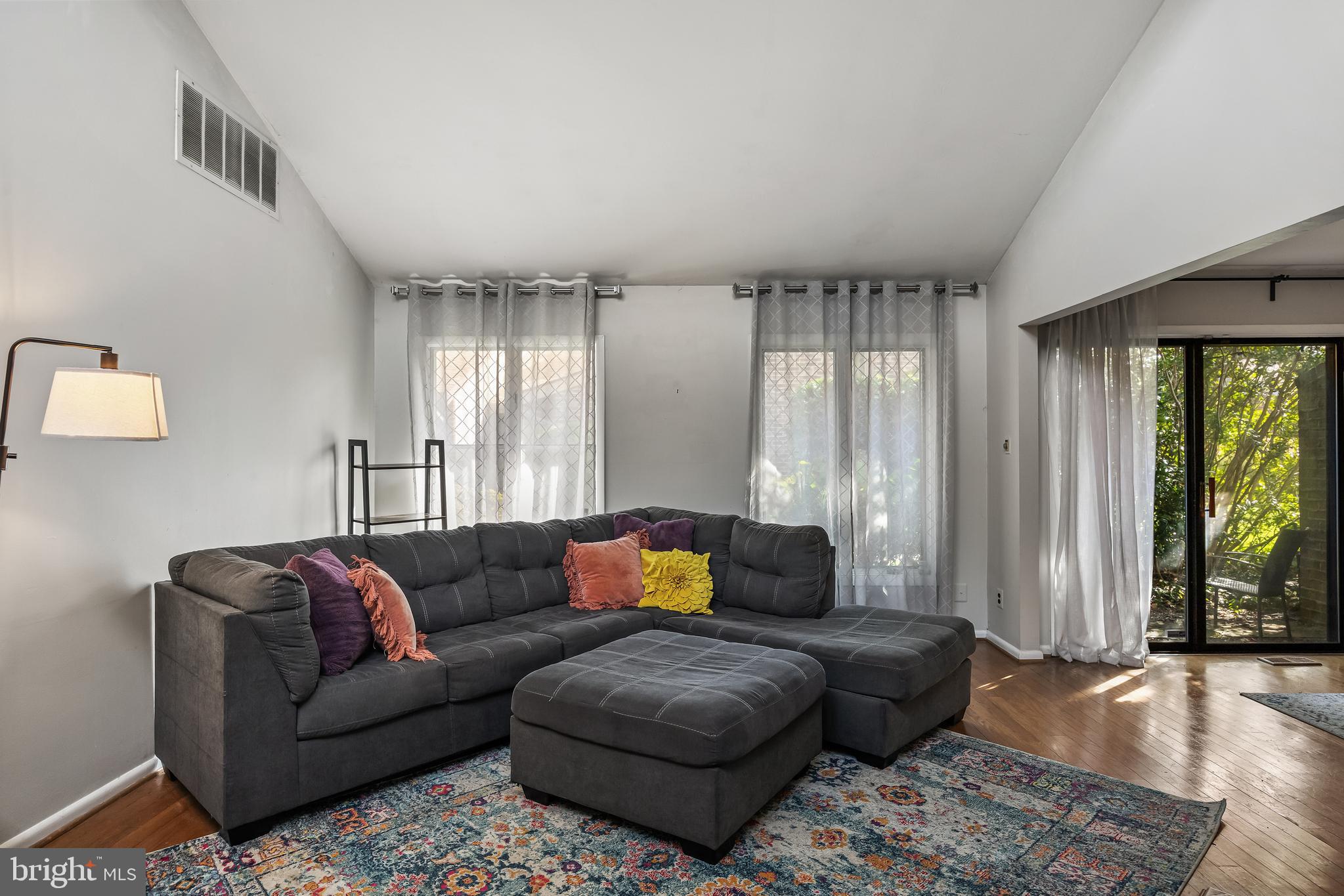 216 Uxbridge Cherry Hill, NJ 08034 - Photo 7 of 30 a living room with furniture and large windows