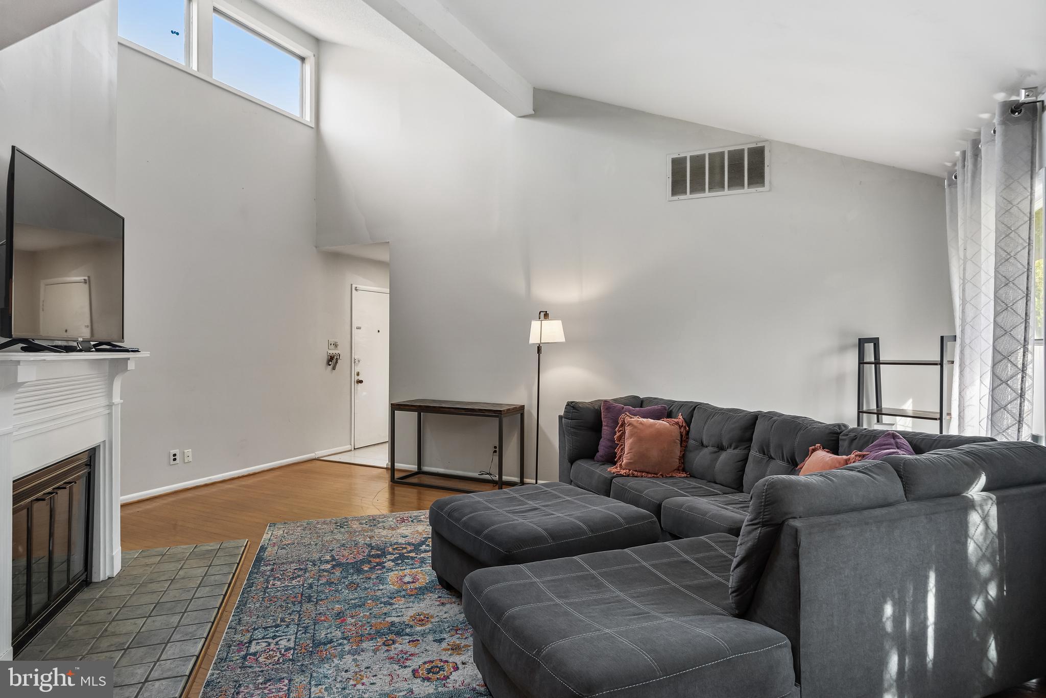216 Uxbridge Cherry Hill, NJ 08034 - Photo 8 of 30 a living room with furniture and a flat screen tv