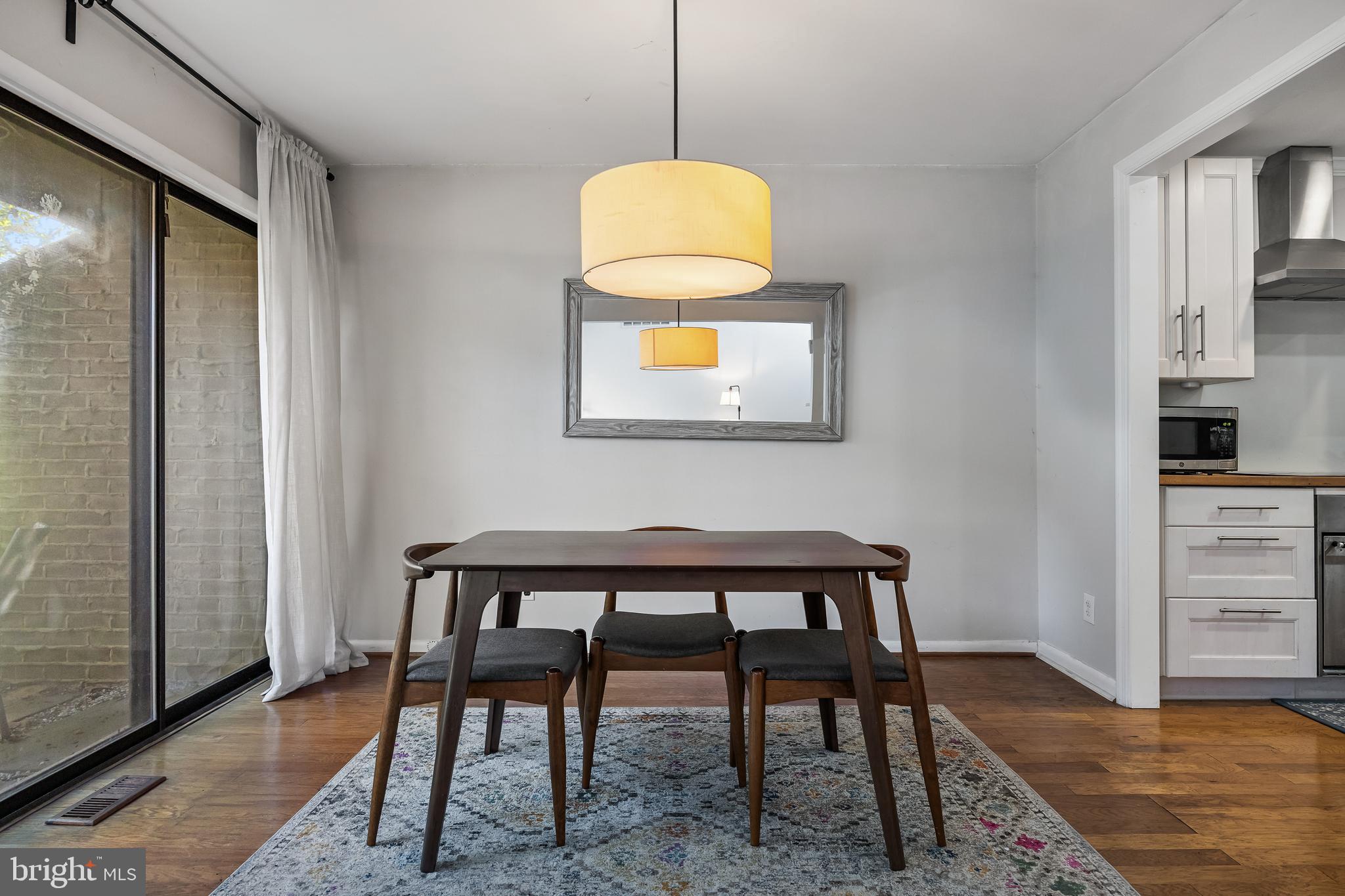 216 Uxbridge Cherry Hill, NJ 08034 - Photo 9 of 30 a view of dining room with furniture and wooden floor