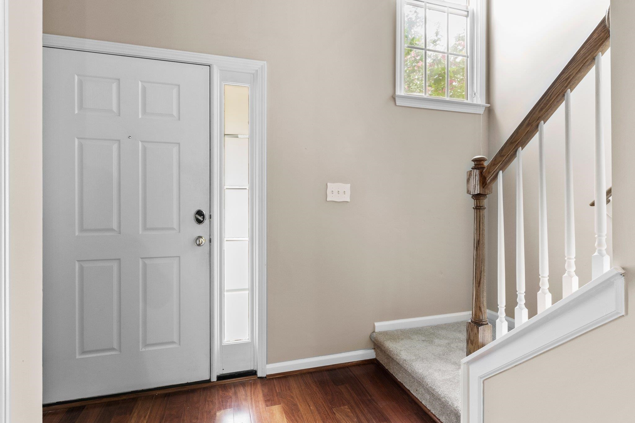 Fresh Paint and New Carpet throughout the entire townhome