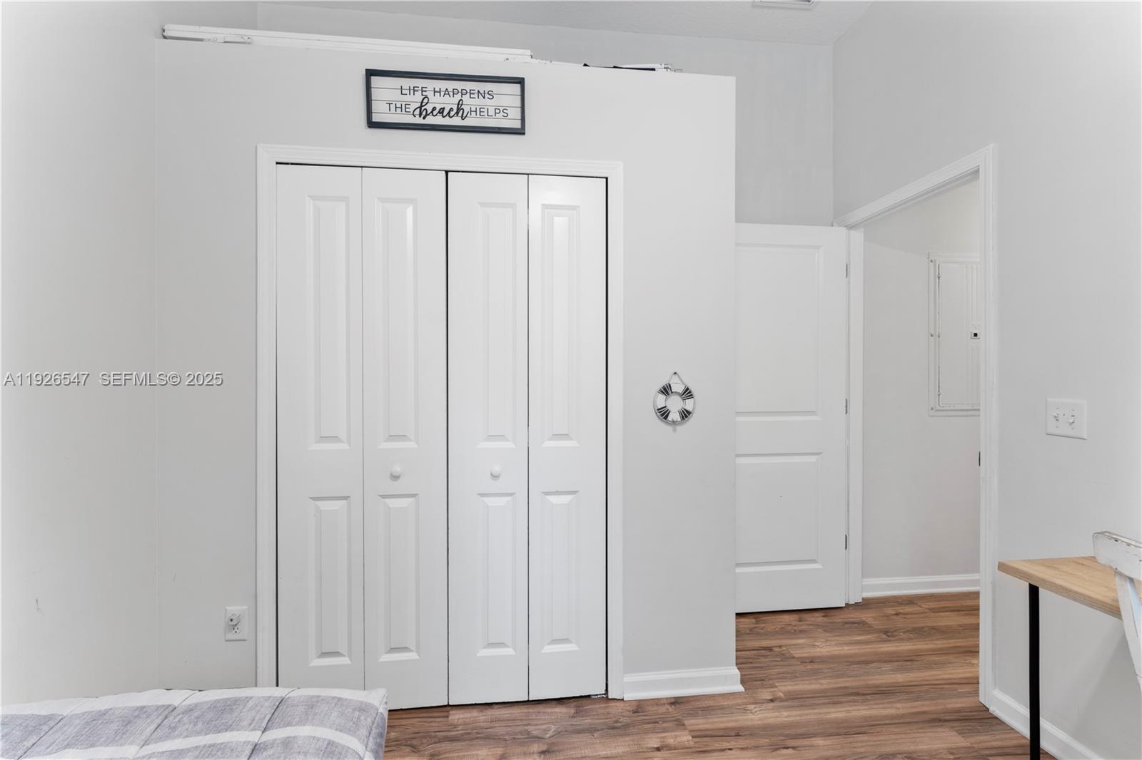 2 Poinciana Cove Road St. Augustine, FL 32084 - Photo 29 of 44 a view of a hallway with wooden floor