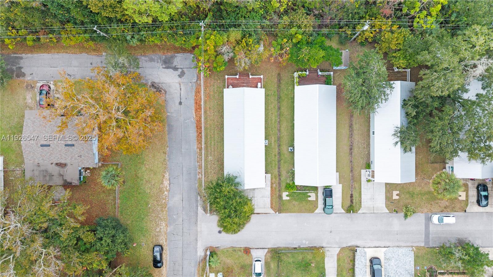 2 Poinciana Cove Road St. Augustine, FL 32084 - Photo 42 of 44 view of a house with a lake view