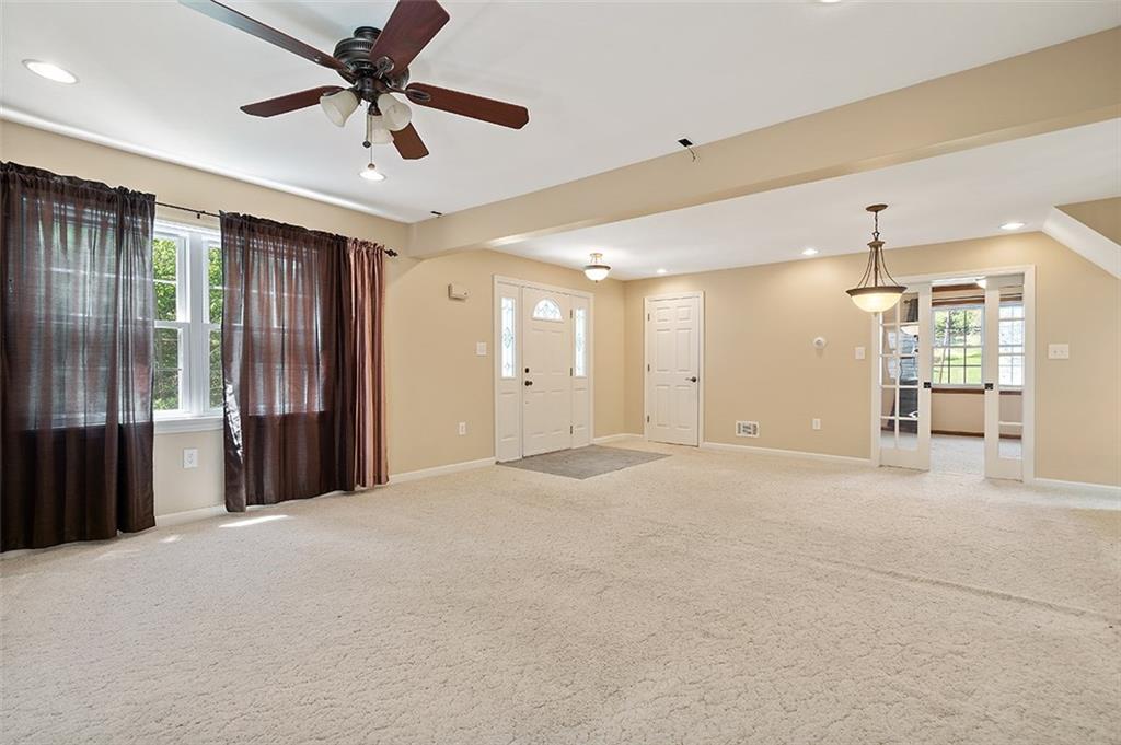 120 Tyler Road Pittsburgh, PA 15237 - Photo 6 of 23 a view of an empty room with a ceiling fan
