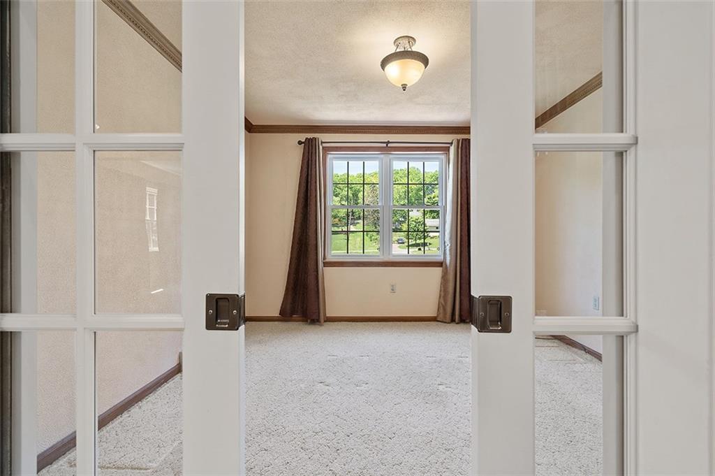 120 Tyler Road Pittsburgh, PA 15237 - Photo 7 of 23 an empty room with windows