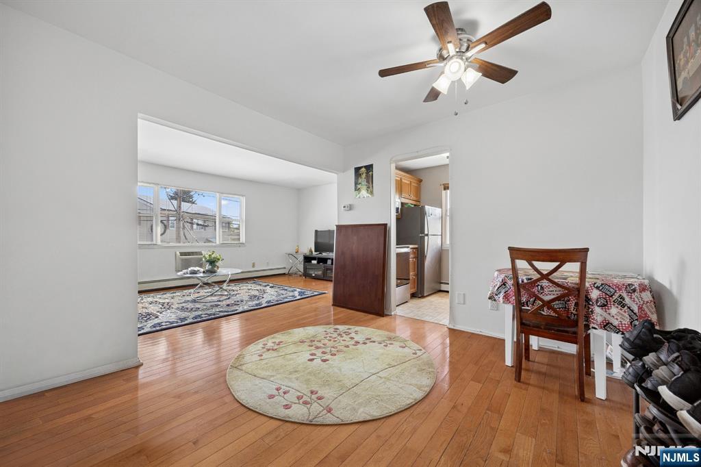 747 Riverside Avenue, Unit C1 Lyndhurst, NJ 07071 - Photo 1 of 16 a view of a livingroom with furniture and wooden floor