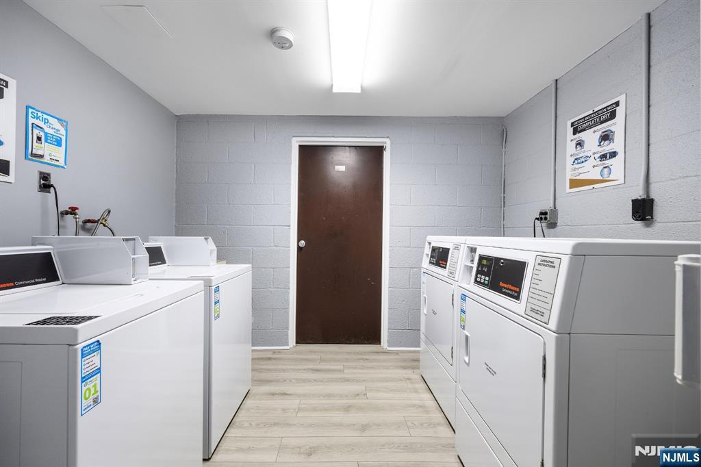 747 Riverside Avenue, Unit C1 Lyndhurst, NJ 07071 - Photo 14 of 16 a utility room with dryer and washer