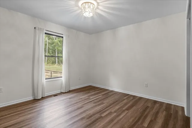 a view of a livingroom with a flat screen tv
