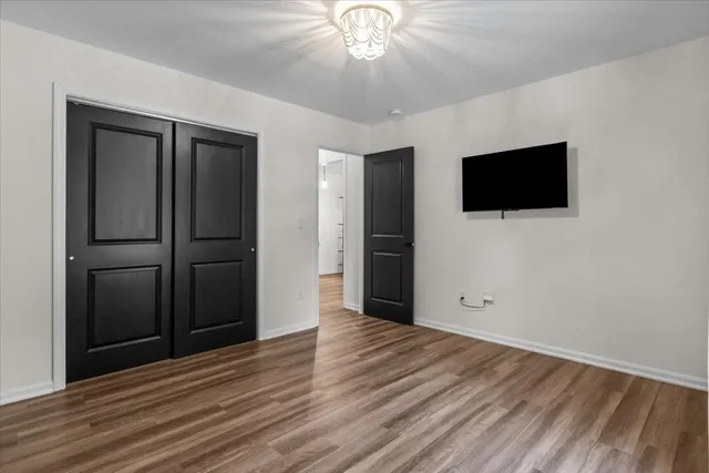 a bathroom with a sink toilet tub and shower