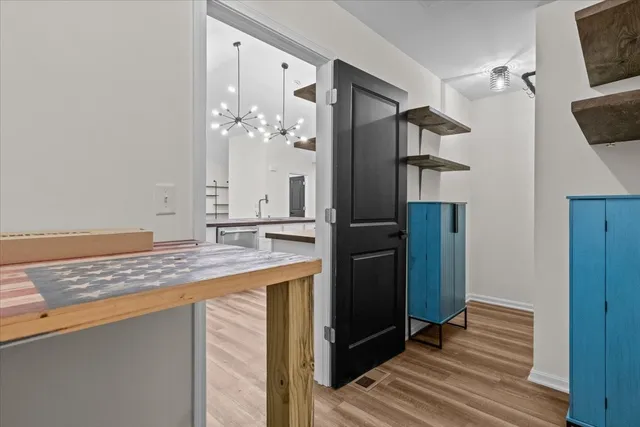 a view of a park with a small house