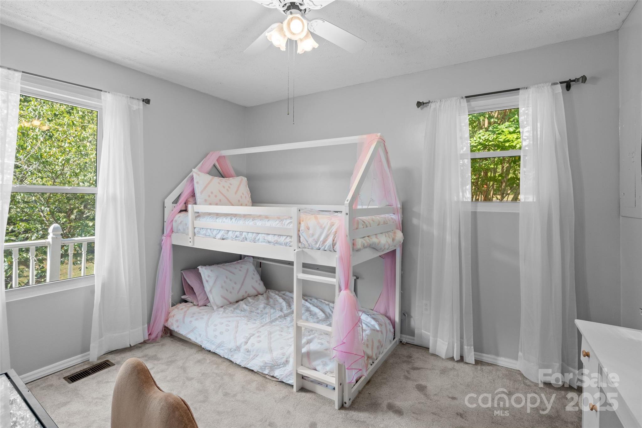 335 Carroll Cove Clover, SC 29710 - Photo 15 of 29 a bedroom with a bed and a window
