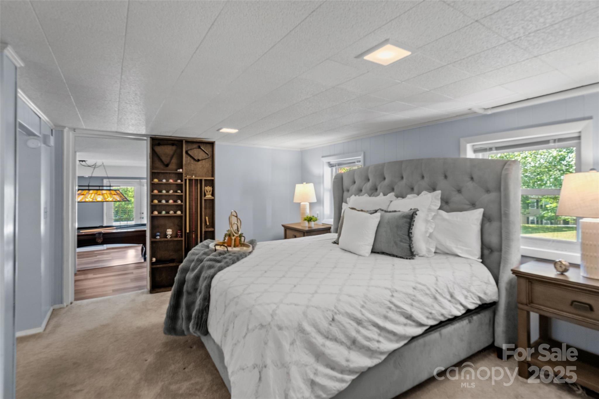 335 Carroll Cove Clover, SC 29710 - Photo 23 of 29 a bedroom with a large bed and a window