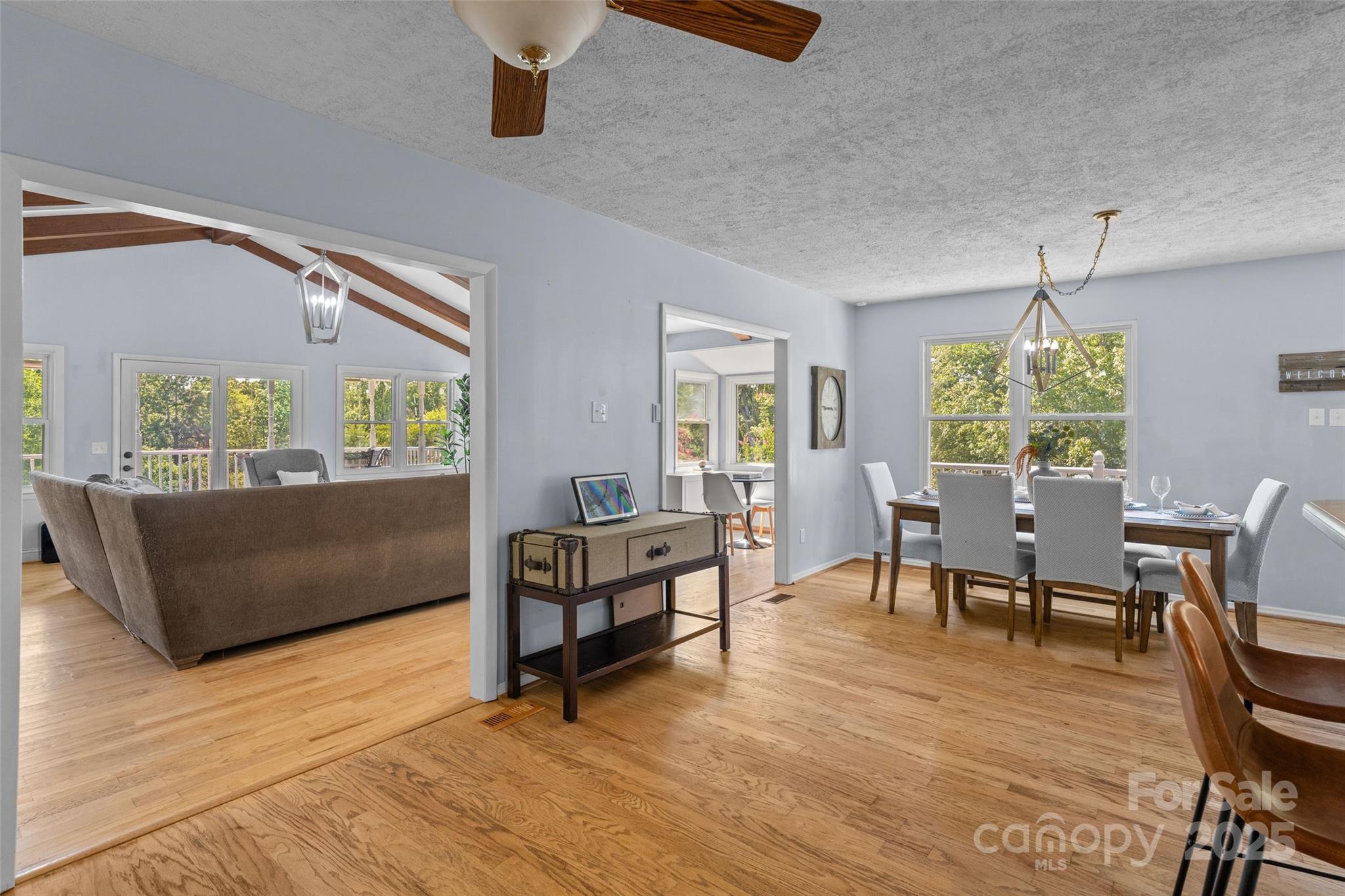 335 Carroll Cove Clover, SC 29710 - Photo 8 of 29 a living room with furniture and a wooden floor