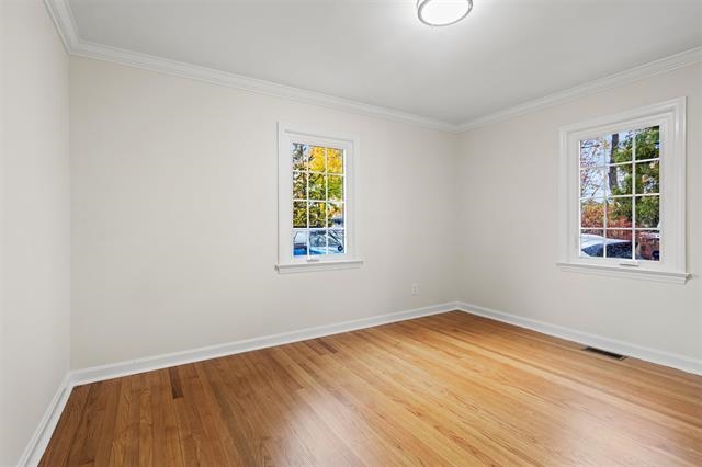 238 Springfield Avenue, Unit 1 Rutherford, NJ 07070 - Photo 12 of 33 an empty room with a window