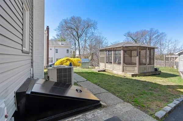 a view of a house with backyard