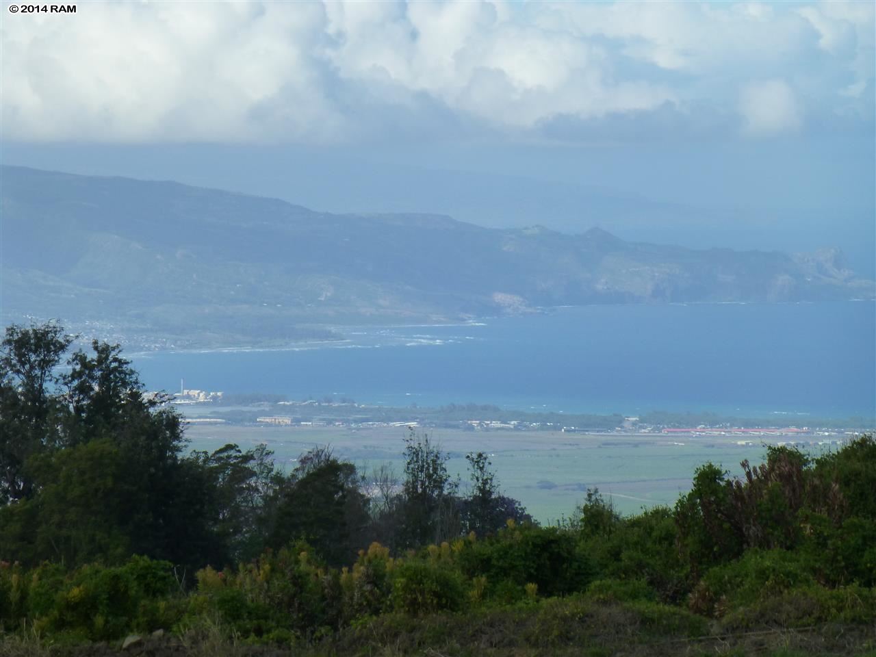 215 B Pulehunui Road Kula, HI 96790 - Photo 8 of 22 a view of a lake and mountain in back
