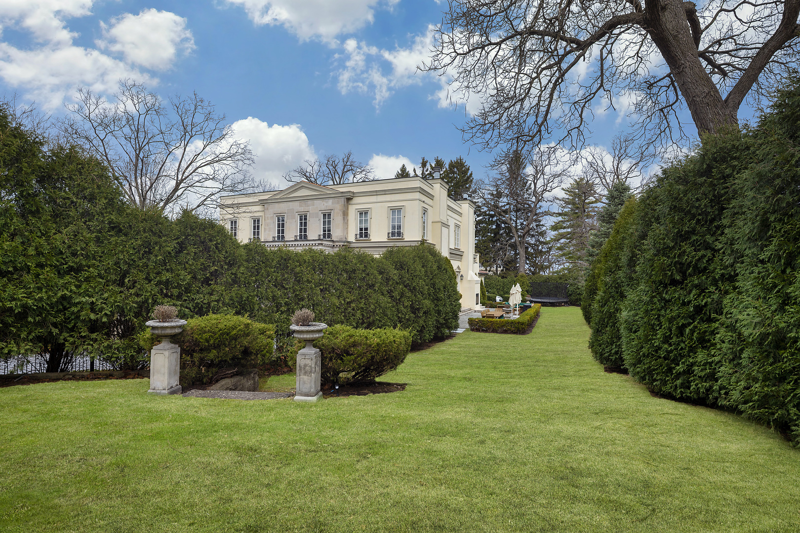 977 Sheridan Road Winnetka, IL 60093 - Photo 2 of 4 a view of a house with a backyard