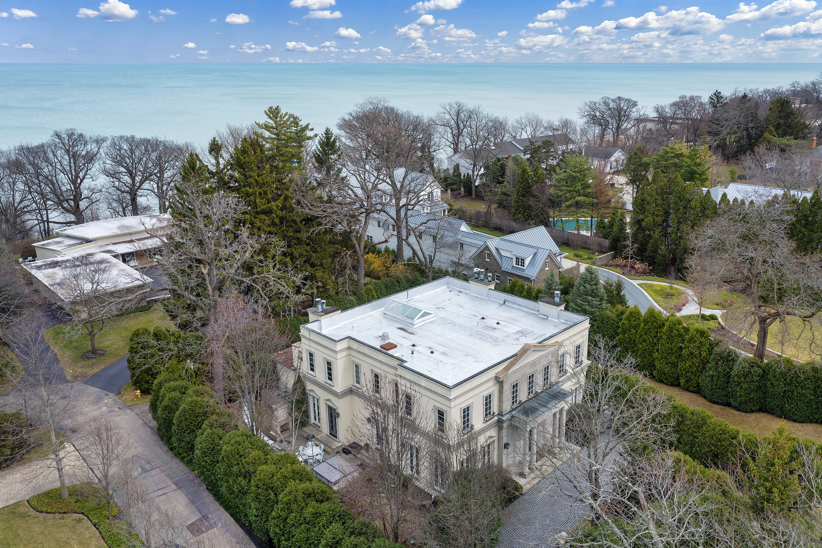 977 Sheridan Road Winnetka, IL 60093 - Photo 4 of 4 a view of a lake with a mountain in the background