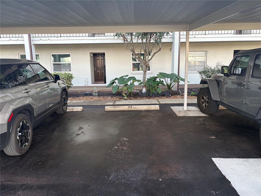 5157 Silent Loop, Unit 115 New Port Richey, FL 34652 - Photo 2 of 18 a view of a livingroom with furniture and a window