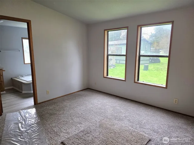 an empty room with windows