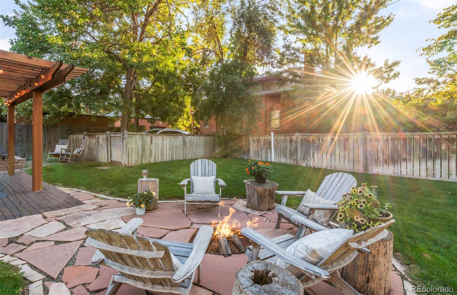 3659 Alcott Street Denver, CO 80211 - Photo 44 of 49 a view of backyard of house with seating space