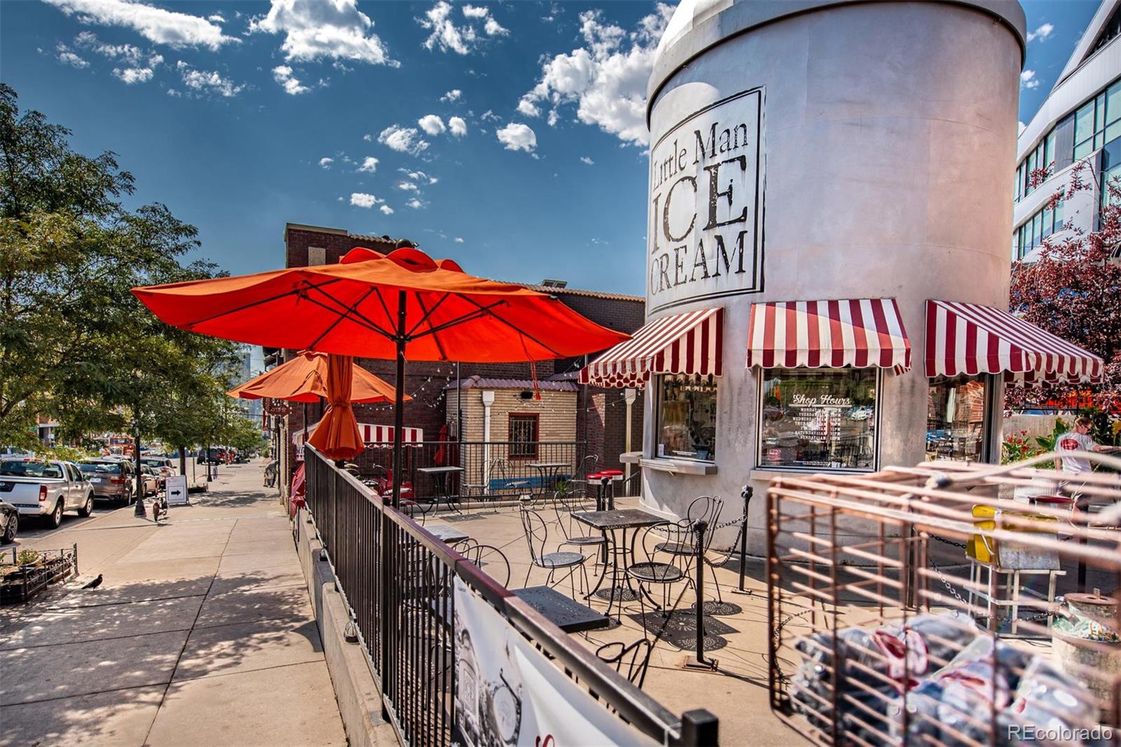 3659 Alcott Street Denver, CO 80211 - Photo 49 of 49 a view of patio with chairs and tables under an umbrella