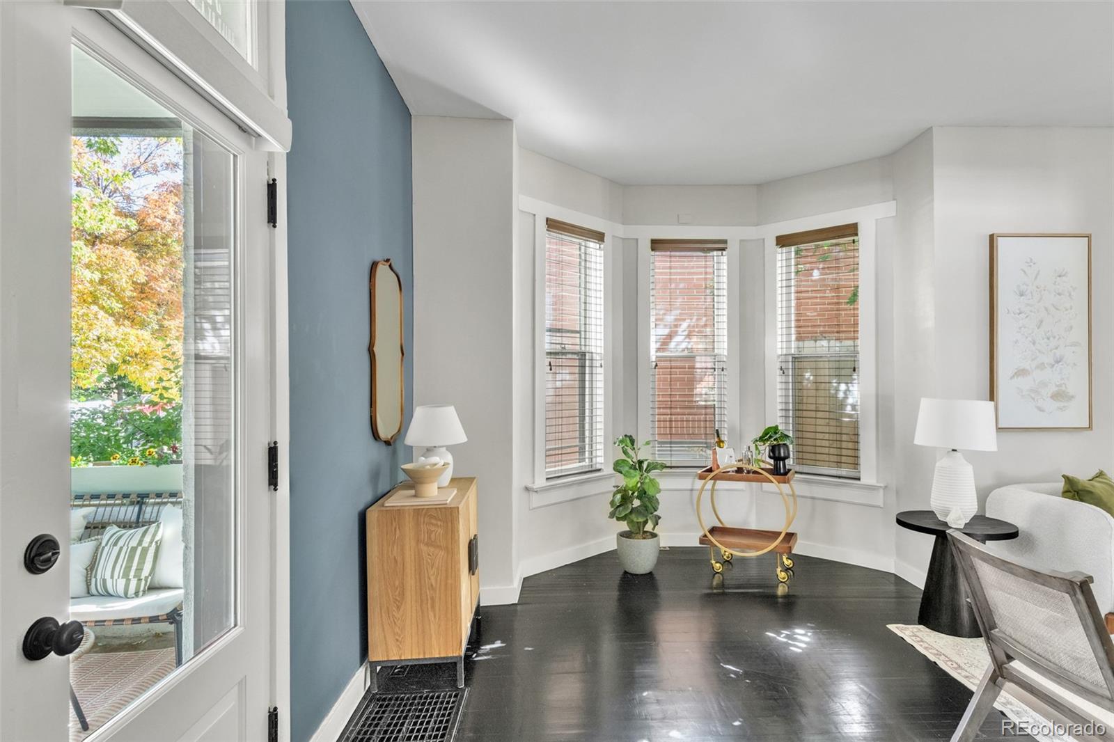 3659 Alcott Street Denver, CO 80211 - Photo 5 of 49 a living room with furniture and a large window