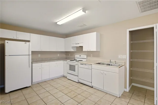 $379,990 | 967 Eisenhower Boulevard, Lehigh Acres, FL 33974