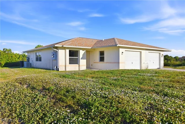 $379,990 | 967 Eisenhower Boulevard, Lehigh Acres, FL 33974