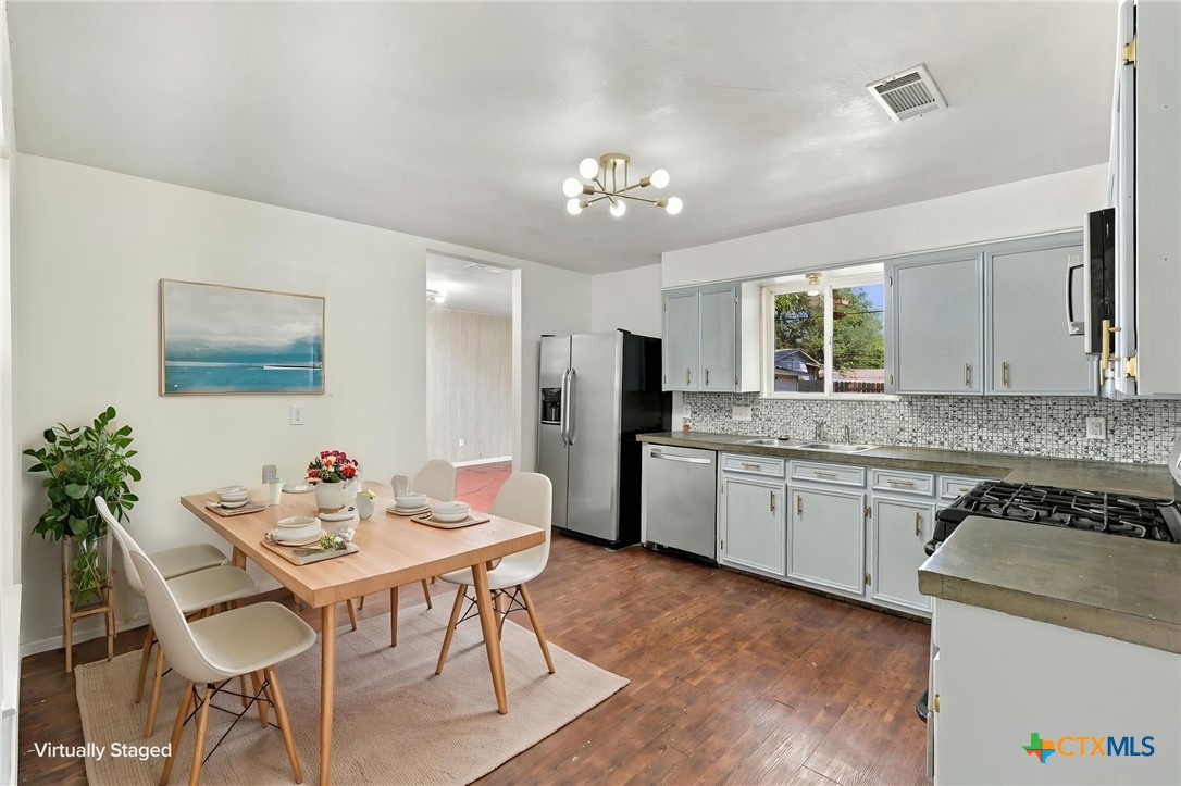904 Kirk Street Taylor, TX 76574 - Photo 8 of 25 Kitchen Virtually Staged