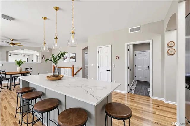 a living room with furniture and a table