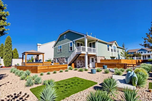 a front view of a house with patio