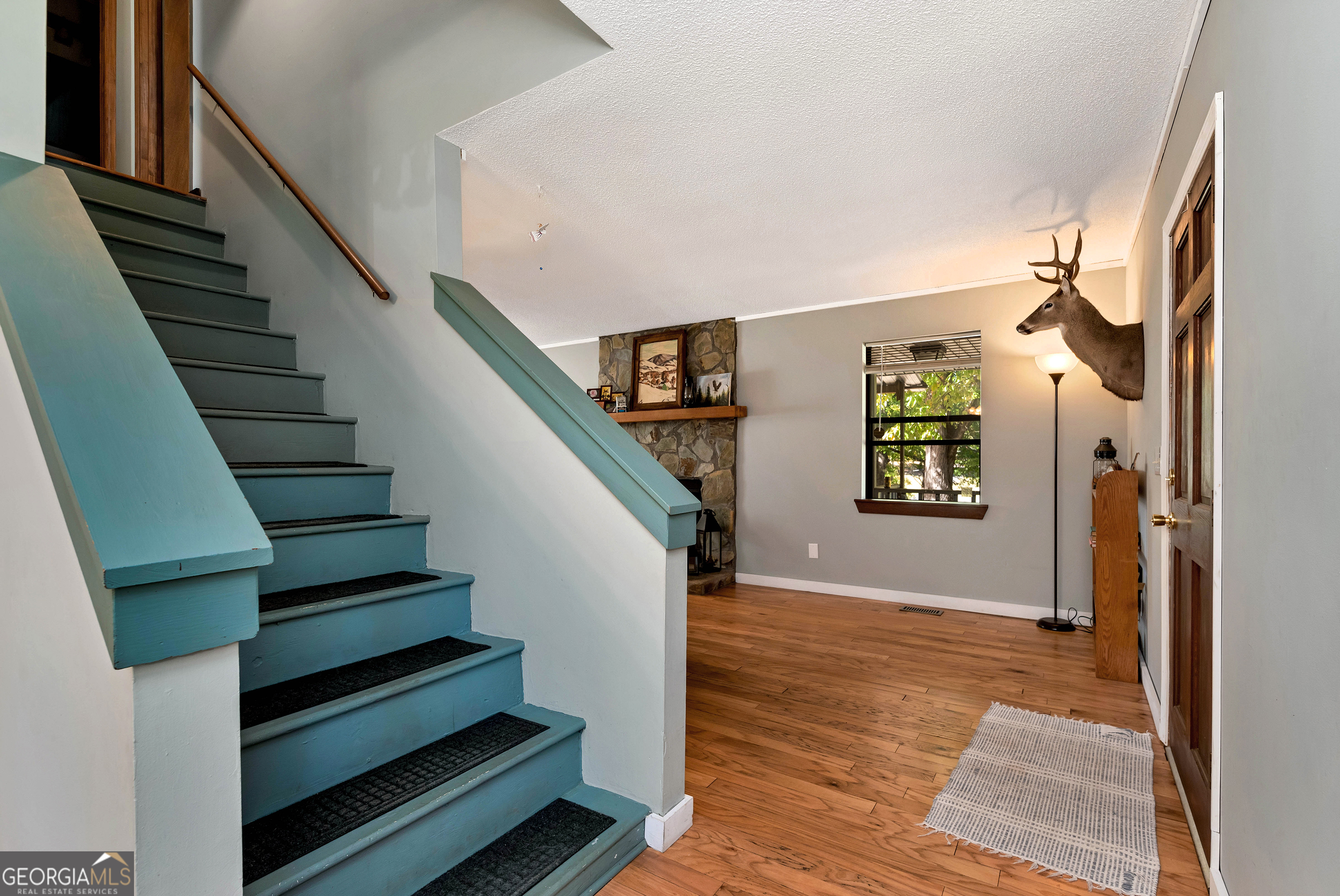 373 Jennys Cove Road Cleveland, GA 30528 - Photo 14 of 44 a view of entryway and hall with wooden floor