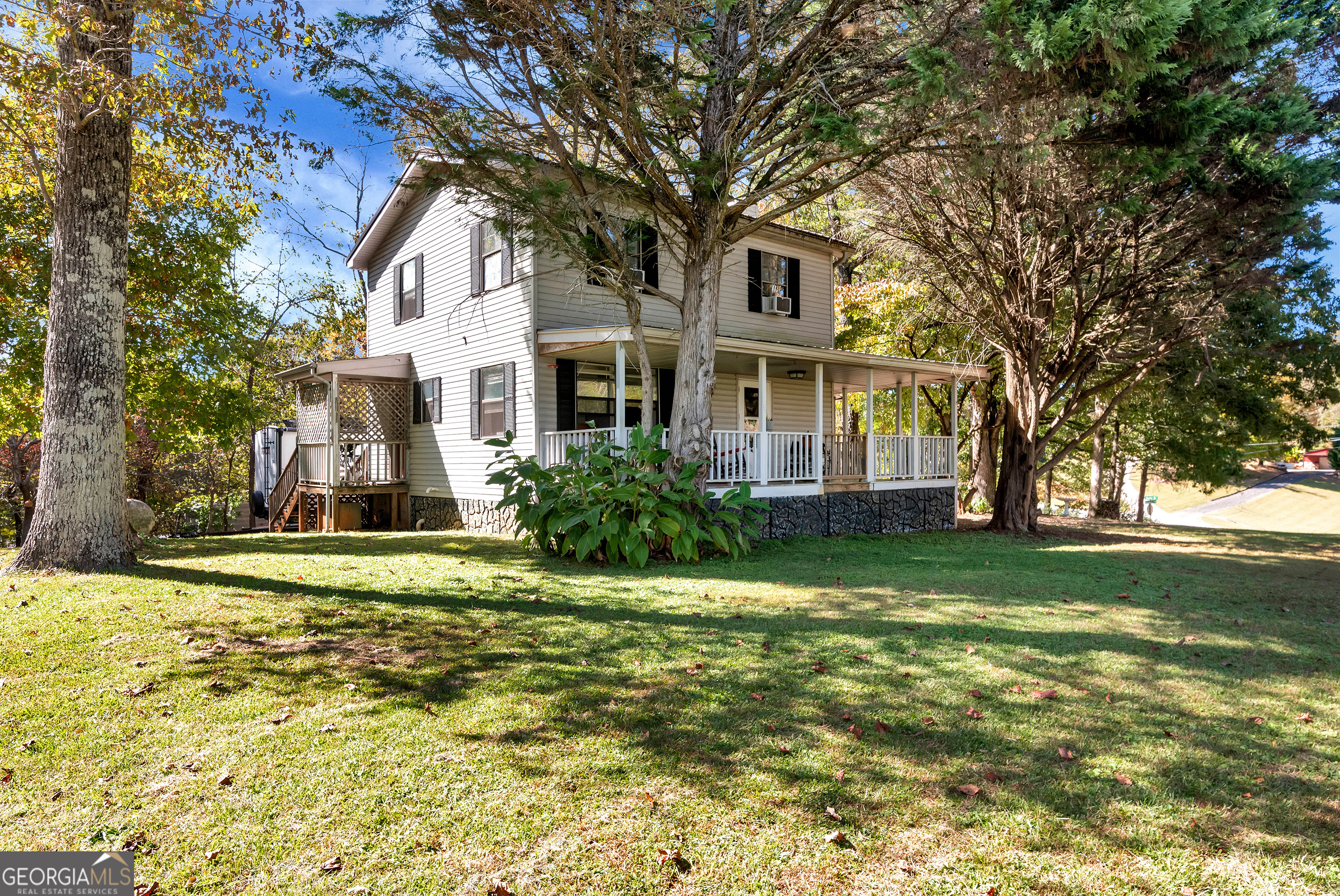 373 Jennys Cove Road Cleveland, GA 30528 - Photo 36 of 44 a front view of a house with a yard