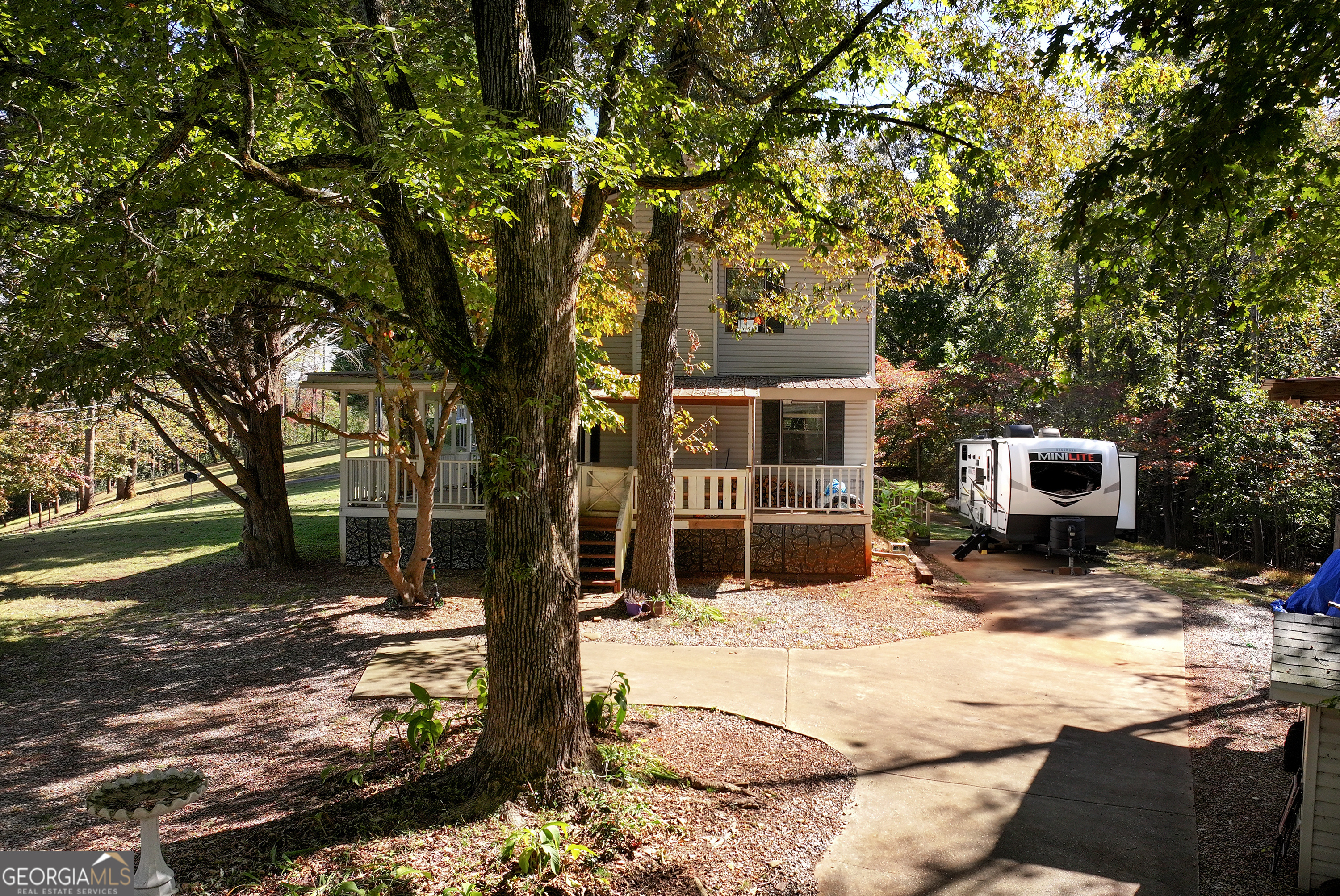 373 Jennys Cove Road Cleveland, GA 30528 - Photo 40 of 44 a house with trees in the background