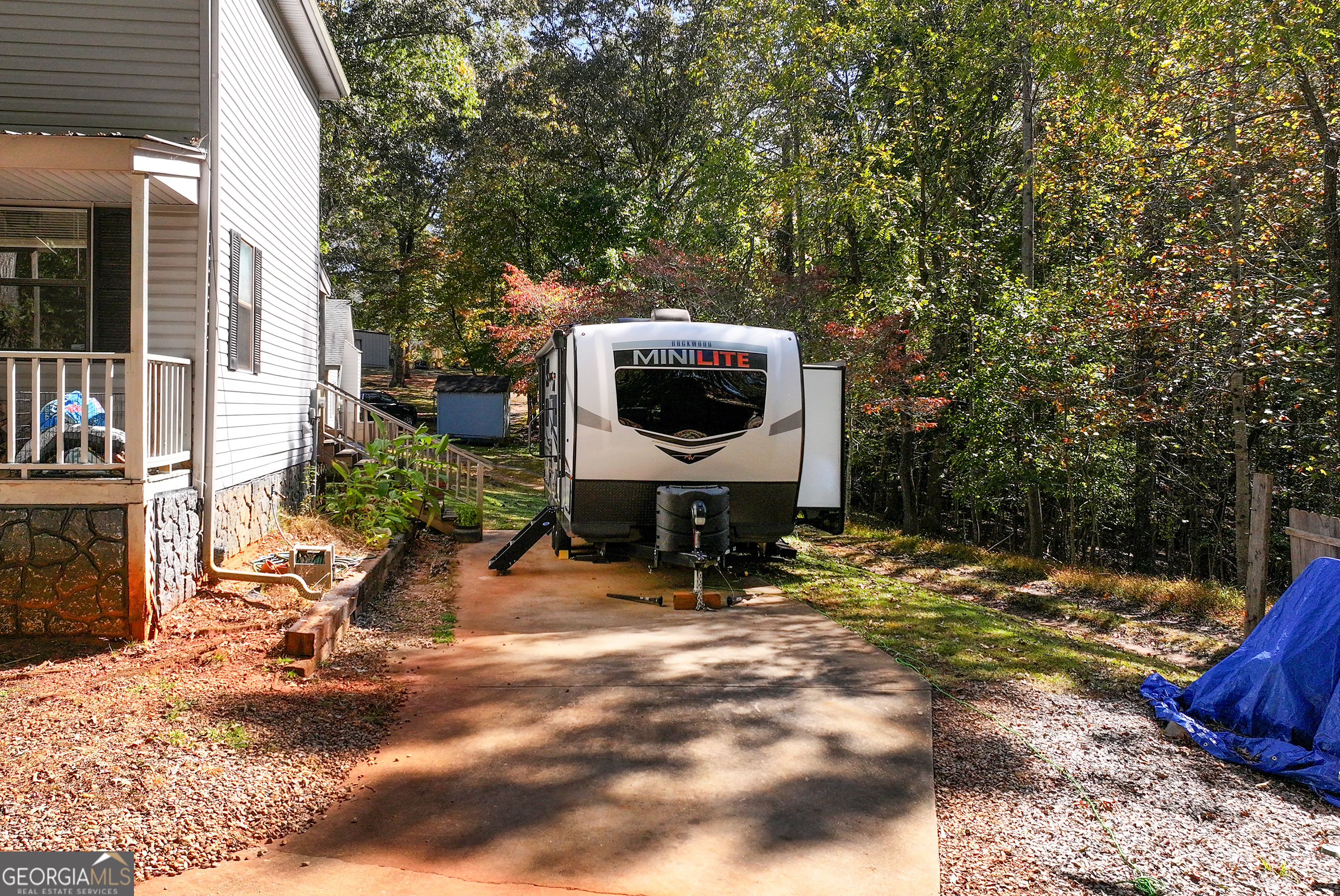 373 Jennys Cove Road Cleveland, GA 30528 - Photo 41 of 44 a view of a backyard with sitting area