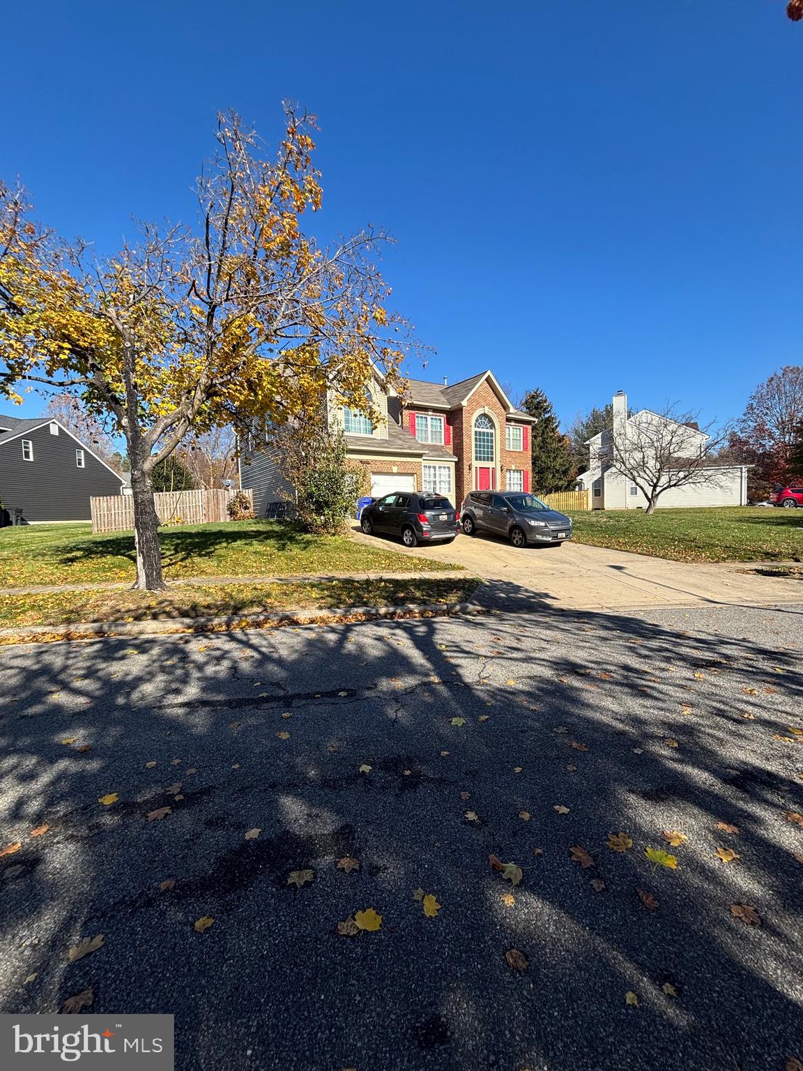 16104 Allenglen Court Bowie, MD 20716 - Photo 3 of 3 a view of a town with large trees and a big yard