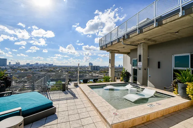 a outdoor space with lots of white furniture