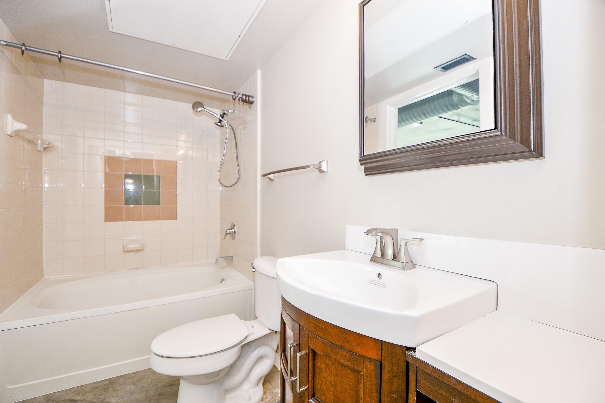 2000 Bagby Street, Unit 5441 Houston, TX 77002 - Photo 26 of 34 a bathroom with a sink toilet a mirror and shower